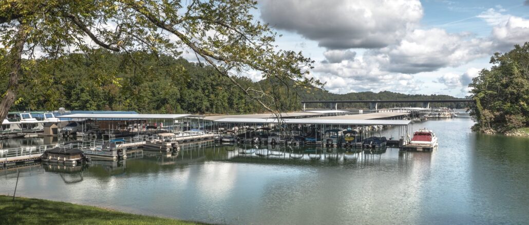 Bridge marina on norris lake with boats docked on cloudy day