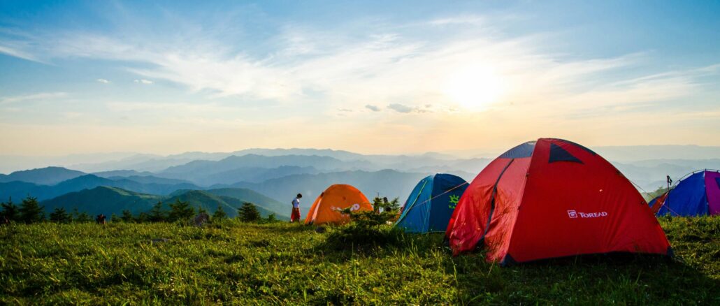 tents camping at cherokee lake with view of mountains